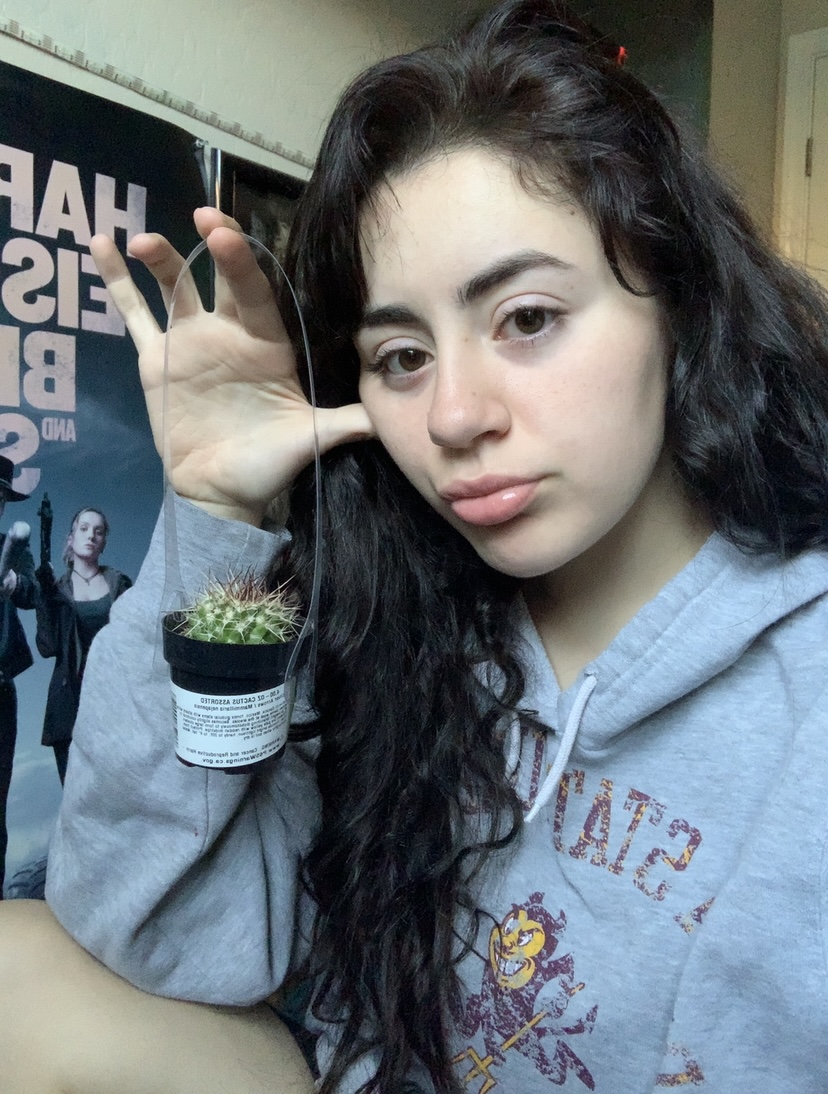 Sandra holding a small cactus